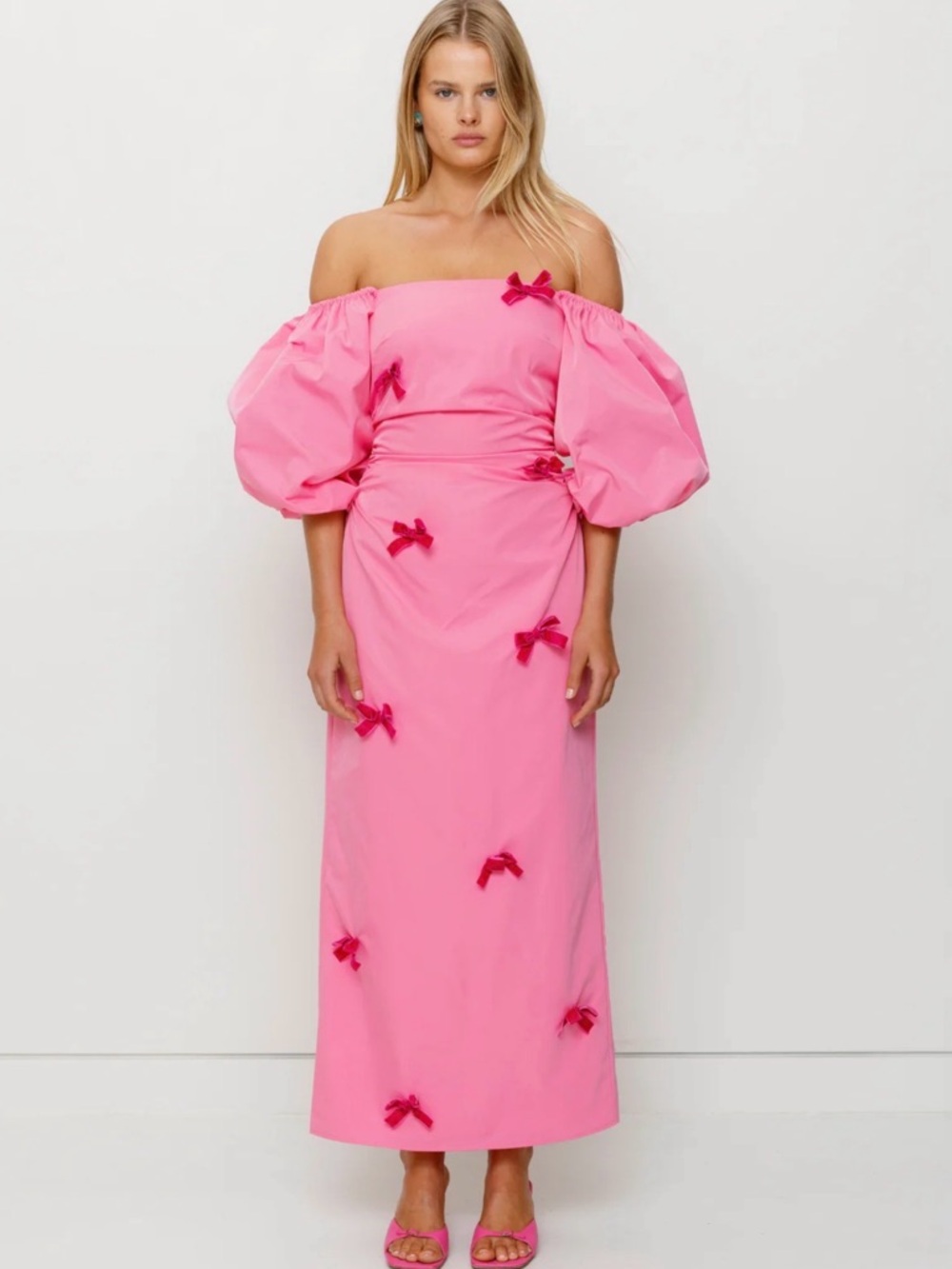 The Wolf Gang Amar Dress | Off-Shoulder Pink Puff-Sleeve Midi Dress with Bows - Picture 2 of 9